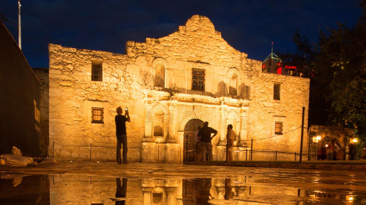 The Alamo -- and a mirror image thanks to puddles left by a passing storm -- in San Antonio. The shrine to Texas liberty attracts visitors from around the world.