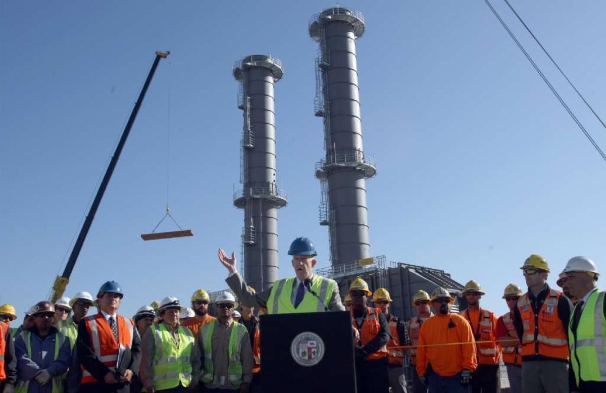 Then-DWP General Manager Ronald Nichols speaks on March 21, 2012, about an earlier repowering project at Haynes, which replaced two aging generating units that used ocean water for cooling with six 100-megawatt fast-start natural gas combustion turbines.