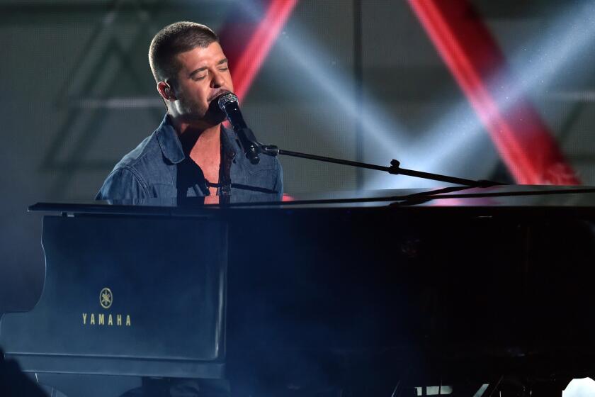 Robin Thicke performs at the BET Awards on Sunday at L.A. Live in downtown Los Angeles.