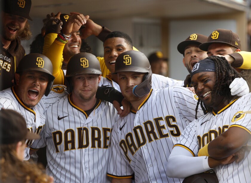Padres outfielder Juan Soto, middle back, celebrates with teammates Wednesday at Petco Park.
