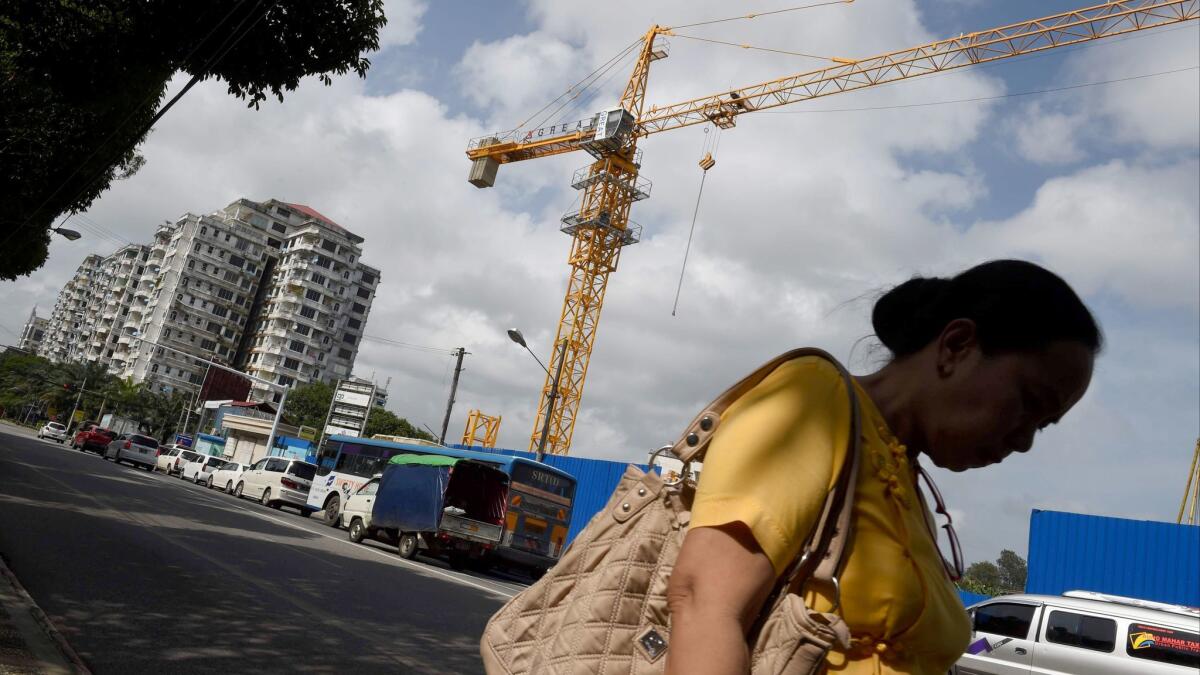 A high-rise apartment building is part of the post-sanctions construction boom in Yangon, Myanmar's largest city.