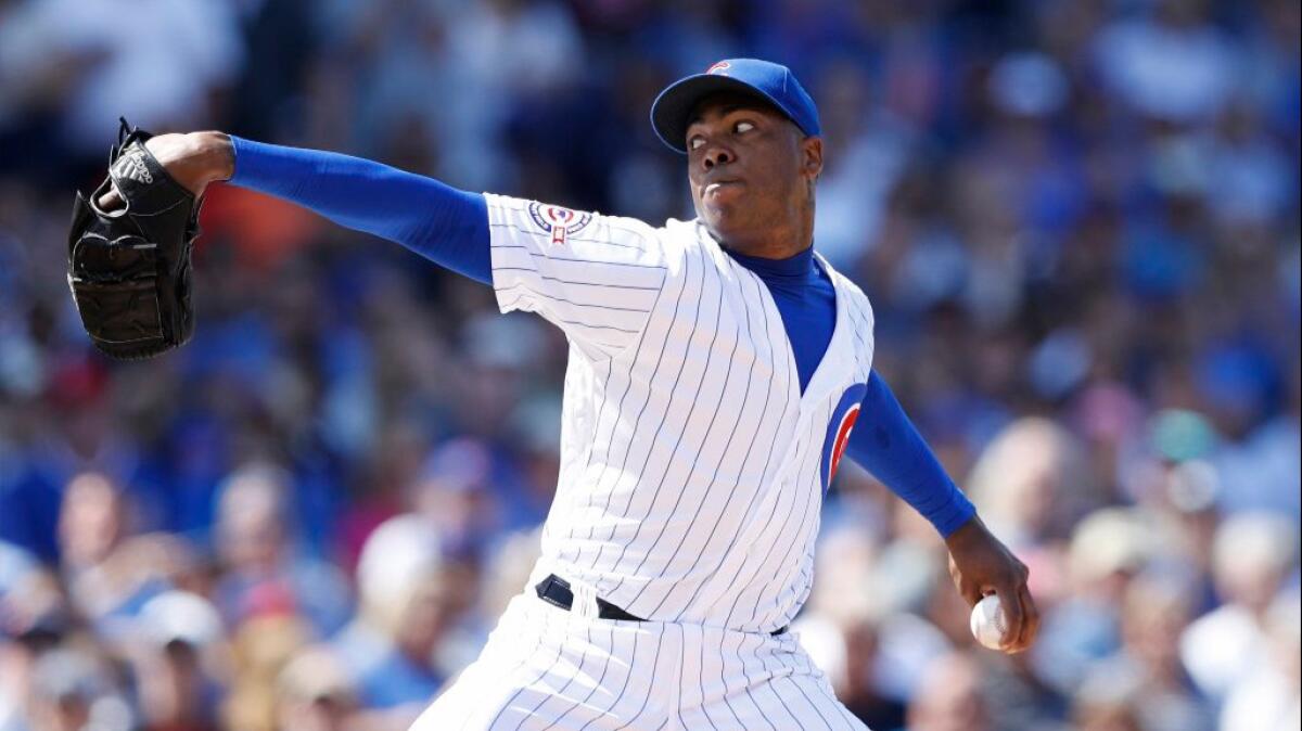 Closer Aroldis Chapman's first pitch in debut with the Cubs was clocked at 101 mph and his last at 103 mph.
