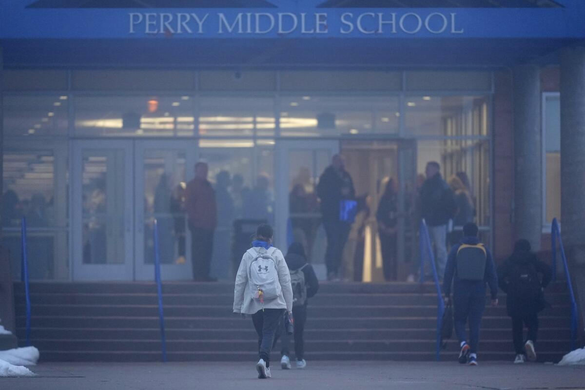 Students arrive at Perry Middle School.