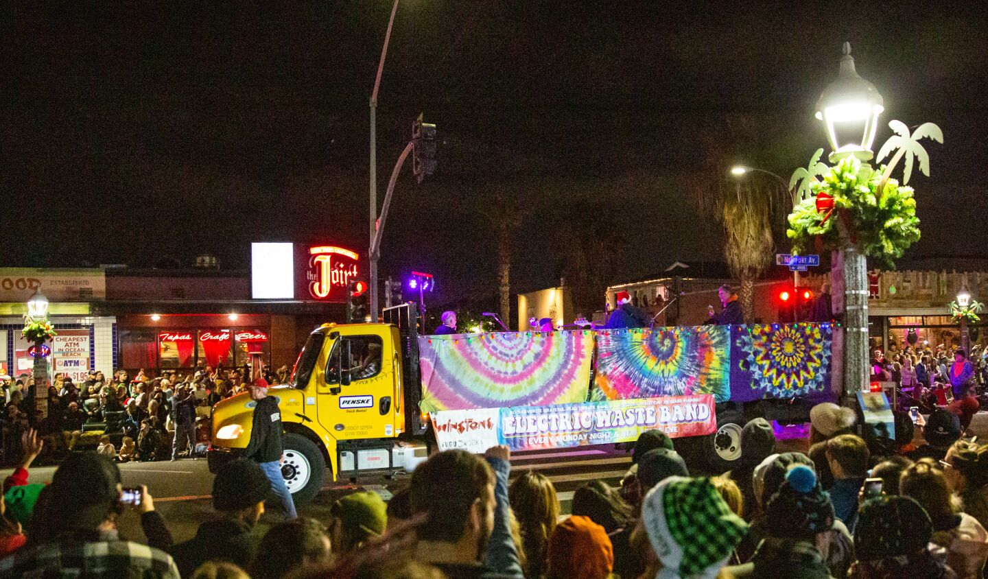 Grateful Dead tribute band Electric Waste Band casts some good vibes on the Ocean Beach Holiday Parade.
