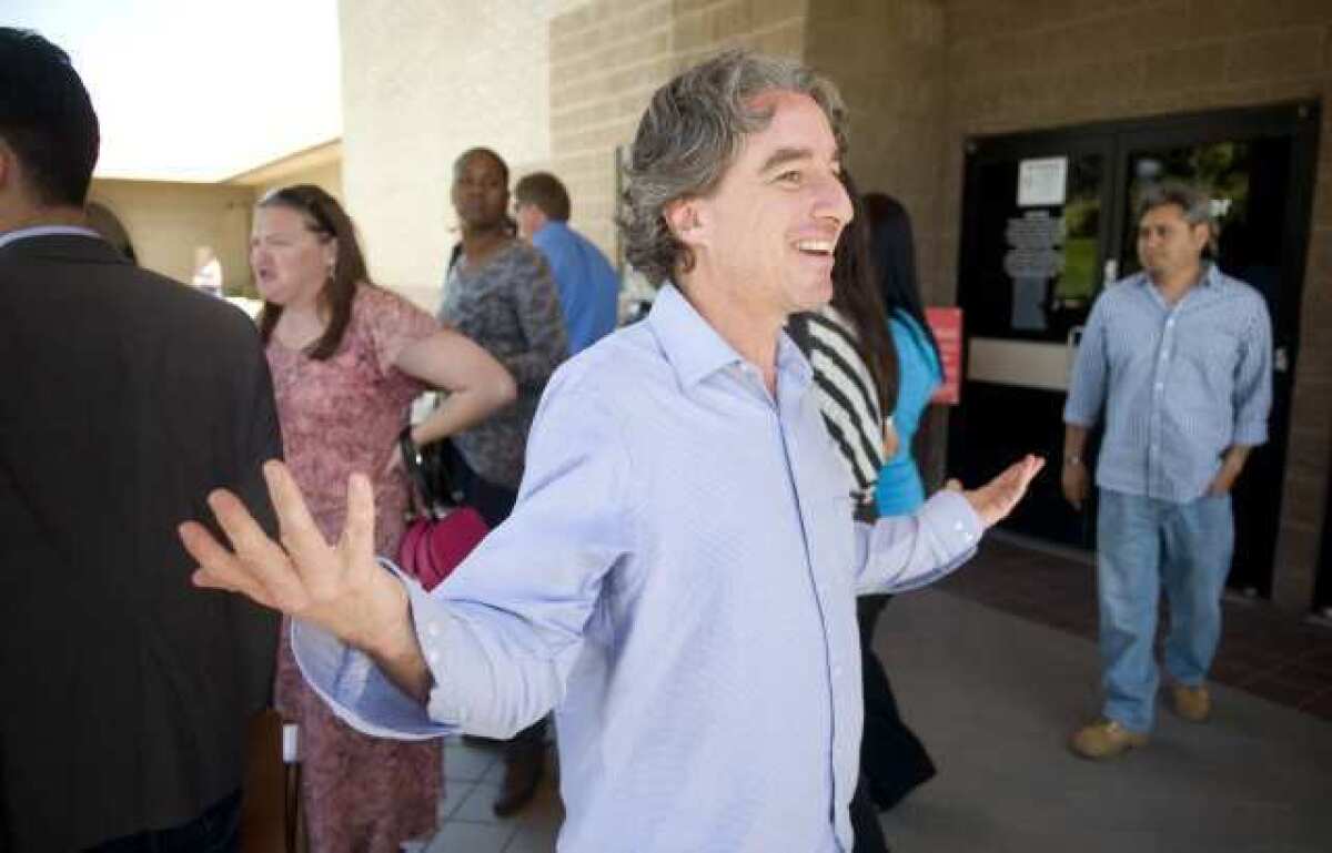 Ben Austin of Parent Revolution is working on helping parents of Adelanto's Desert Trail Elementary School take the school over under the new Parent Trigger Law. He is shown expressing his surprise over how their first day in court.