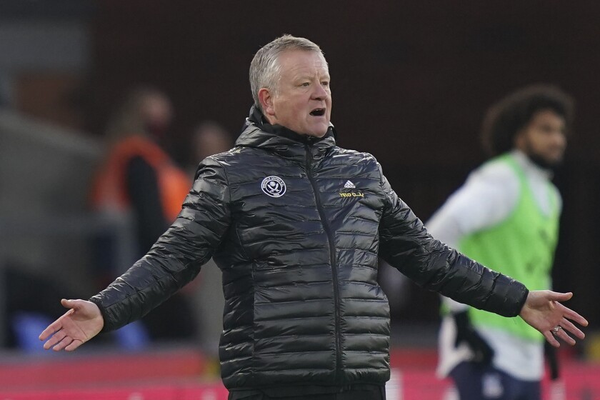 Sheffield United's manager Chris Wilder gestures during the English Premier League soccer match between Crystal Palace and Sheffield United in London, England, Saturday, Jan. 2, 2021. (John Walton/Pool via AP)