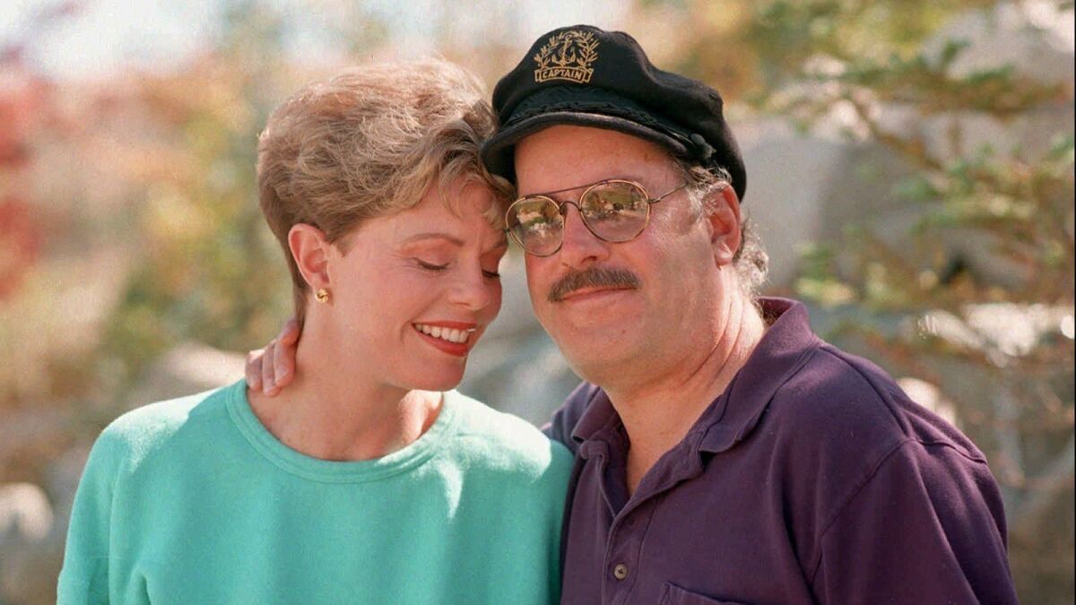 Toni Tennille, left, and Daryl Dragon in 1995. Dragon died Wednesday at 76.