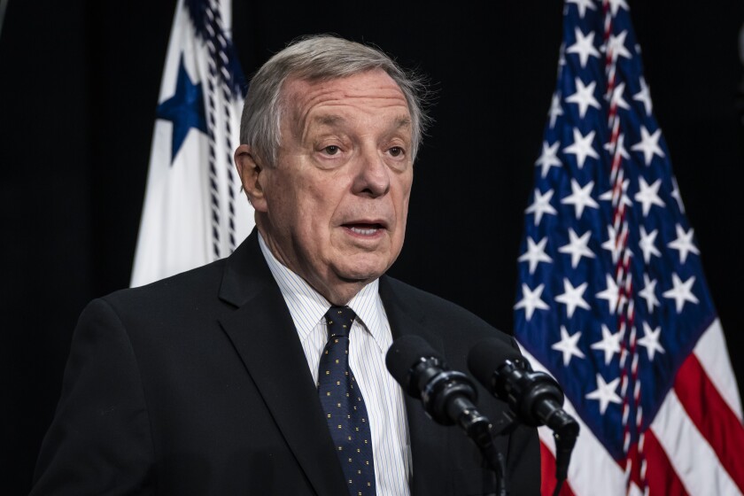FILE - Sen. Richard Durbin speaks before Vice President Kamala Harris at the C.W. Avery Family YMCA in Plainfield, Ill., Friday, June 24, 2022. The chairman and ranking minority member of the Senate Judiciary Committee sent a letter to an advocacy group for minor leaguers asking questions about baseball's antitrust exemption. Sen. Richard Durbin, an Illinois Democrat who chairs the committee, and Charles Grassley, an Iowa Republican, sent the letter Tuesday, June 28, to Harry Marino, executive director of Advocates for Minor Leaguers.(Ashlee Rezin/Chicago Sun-Times via AP, File)