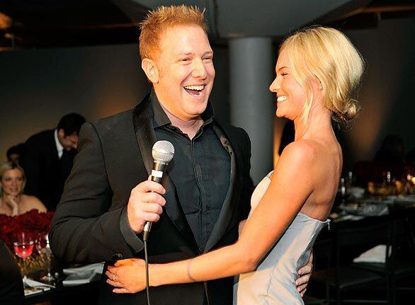 Ryan Kavanaugh, chairman of the Art of Elysium and founder of Relativity Media, and actress Kate Bosworth share a laugh during "Heaven," the Art of Elysium's black-tie charity gala, on Jan. 16 in Beverly Hills.