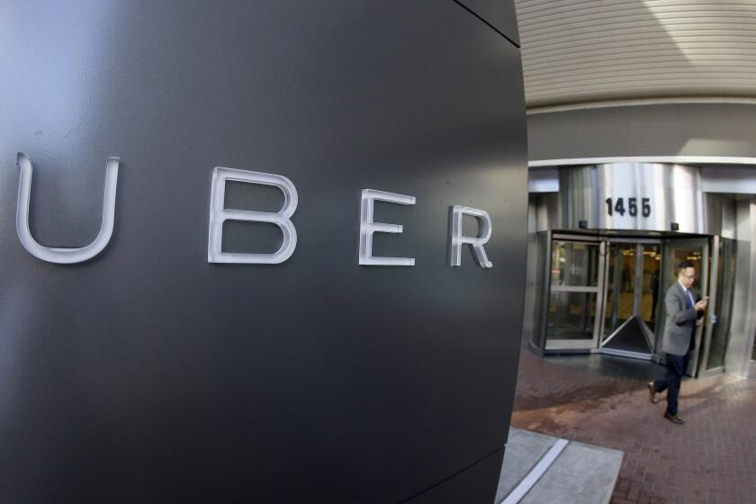 Uber is one of the ride-sharing services that operates at Bob Hope Airport. Above, a man leaves the headquarters of Uber in San Francisco.