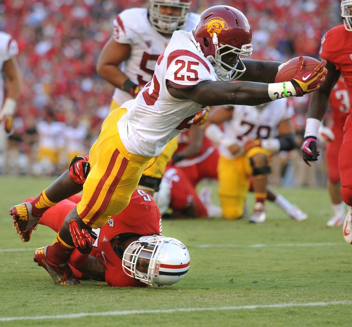 USC running back Silas Redd says he won't play in the Trojans' season opener against Hawaii on Thursday.