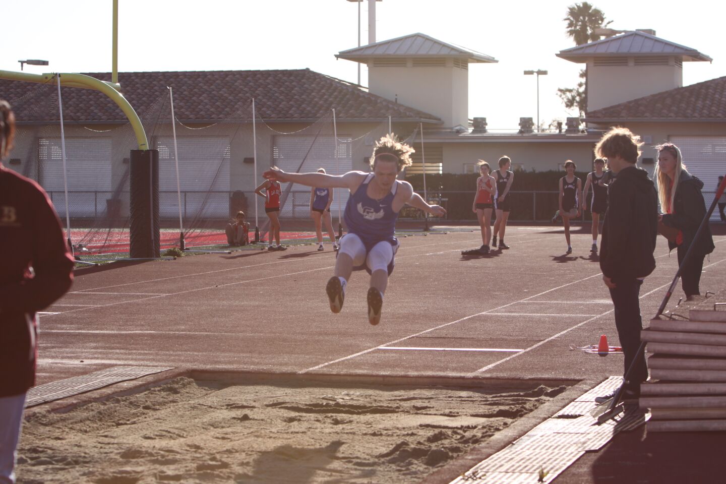 La Jolla Country Day School junior Charlie Gooding competes in the long jump.