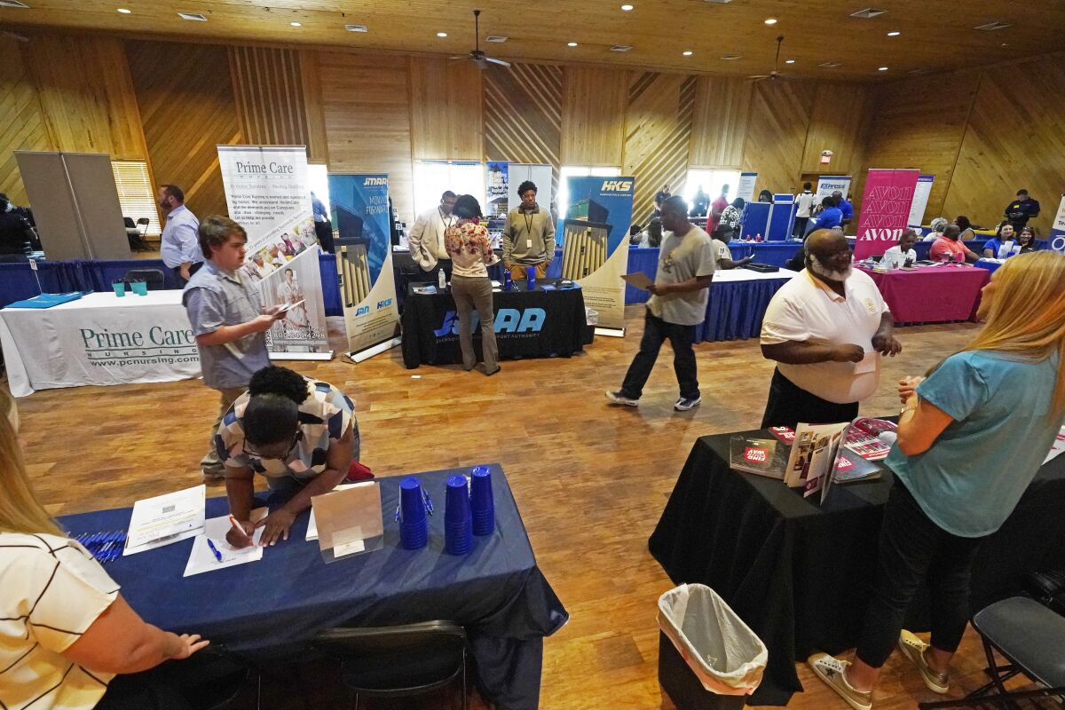 FILE - Veterans, the formerly incarcerated, and job seekers wanting to change professions, were invited to attend the 2022 Mississippi Re-Entry Job Fair in Jackson, Miss., on June 22, 2022. Applications for jobless aid for the week ending July 9 rose by 9,000 to 244,000, up from the previous week's 235,000, the Labor Department reported Thursday, July 14, 2022. First-time applications generally reflect layoffs. Analysts had expected the number to remain flat from the previous week. (AP Photo/Rogelio V. Solis)