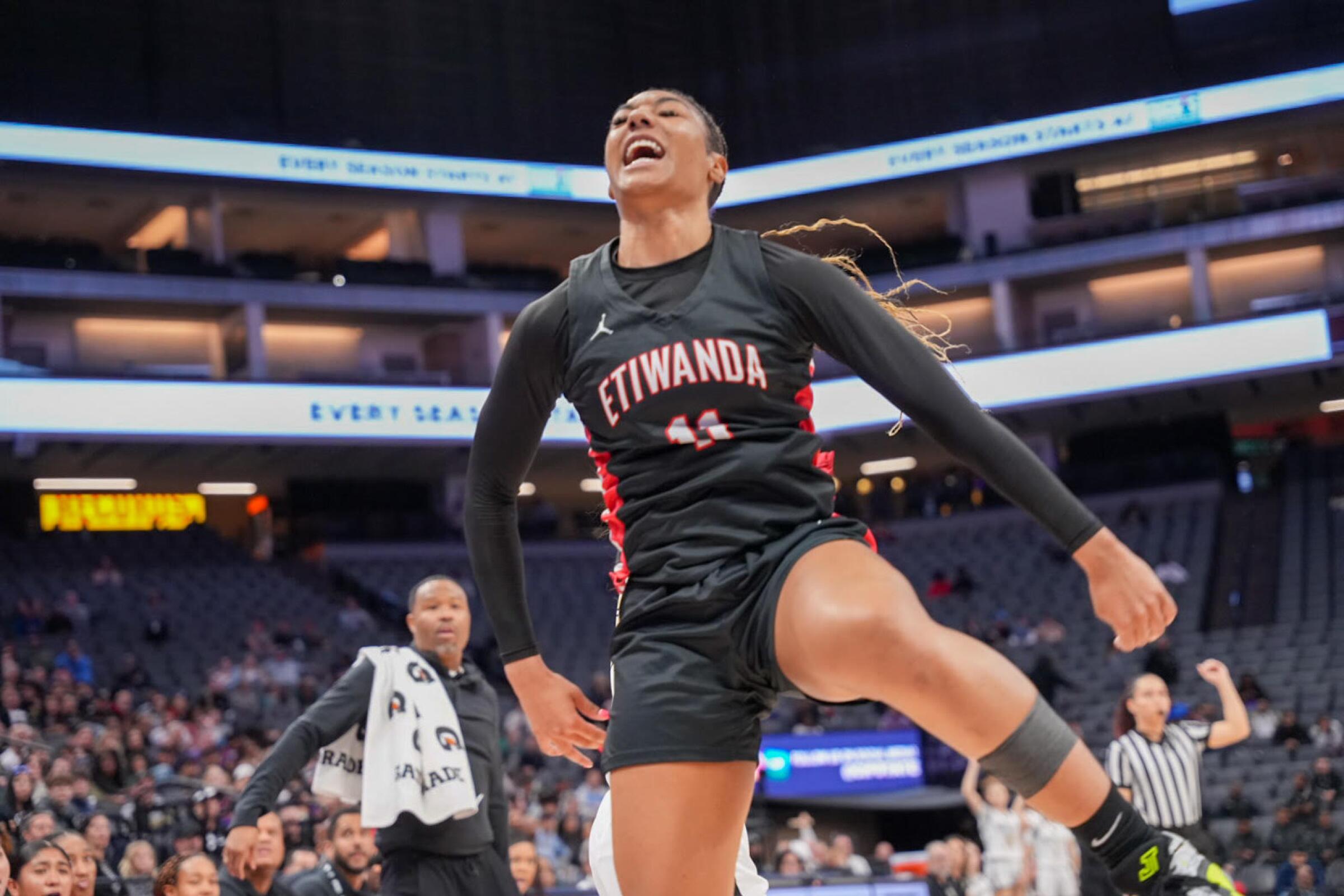 McDonald's All-American Kennedy Smith of Etiwanda celebrates during the first half.