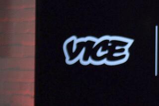 FILE - The Vice logo is seen at a joint venture announcement between Vice Media and Roger Communications in Toronto, Oct. 30, 2014. Vice Media's CEO has said in a memo to staff members that the troubled company plans to lay off several hundred employees. Bruce Dixon said Thursday, Feb. 22, 2024, that staff members affected by the layoffs will be notified early the following week. (Nathan Denette/The Canadian Press via AP, File)