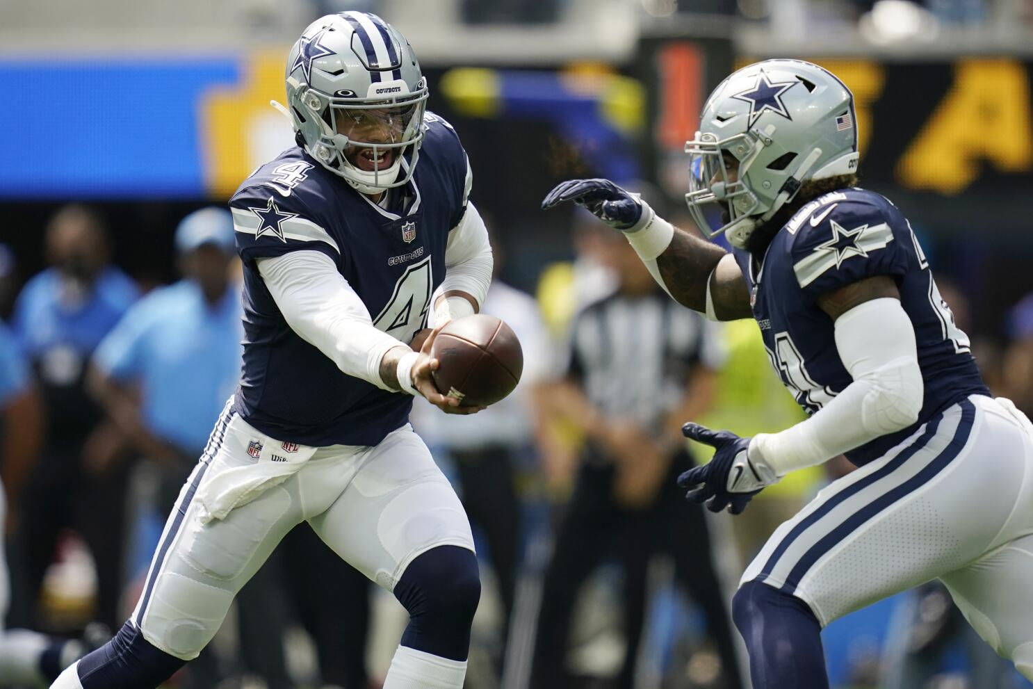 Running back (20) Tony Pollard of the Dallas Cowboys runs and scores a  touchdown against the Los Angeles Chargers in an NFL football game, Sunday,  Sept. 19, 2021, in Inglewood, Calif. The