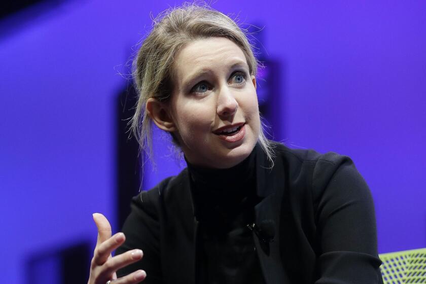 FILE - In this Nov. 2, 2015 file photo, Elizabeth Holmes, founder and CEO of Theranos, speaks at the Fortune Global Forum in San Francisco. Oscar-winning filmmaker Alex Gibney has premiered his latest documentary on the fraudulent tech startup Theranos at the Sundance Film Festival Thursday night, Jan. 24, 2019. (AP Photo/Jeff Chiu, File)