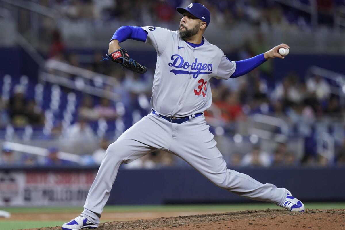 Dodgers reliever David Price works against the Miami Marlins on Aug. 26, 2022, in Florida.