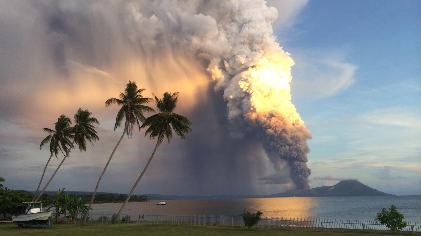 Mount Tavurvur erupts in eastern Papua New Guinea, spewing rocks and ash into the air, forcing the evacuation of local communities and rerouting of international flights.