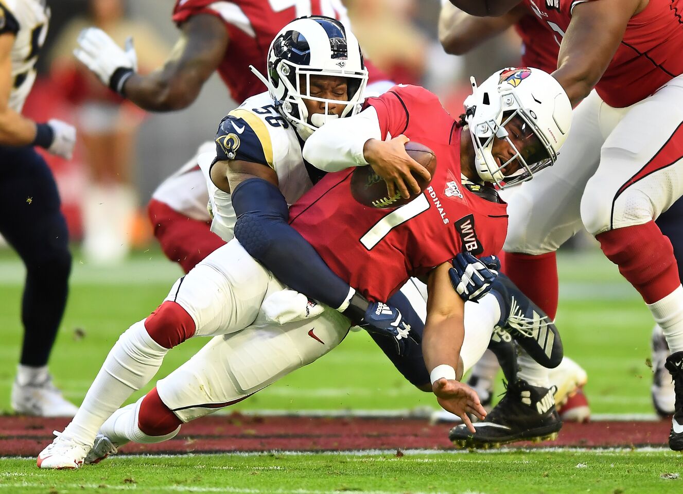 Rams linebacker Dante Fowler Jr. sacks Cardinals quarterback Kyler Murray.