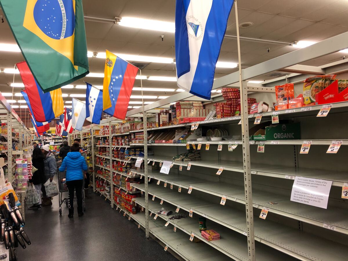 Shelves are picked over in the Northgate Market in Culver City.
