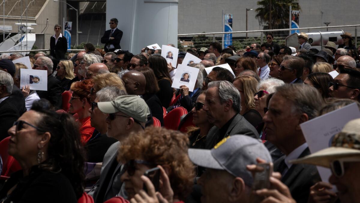 Hundreds of people remember Joan Jacobs during a memorial service at The Rady Shell at Jacobs Park