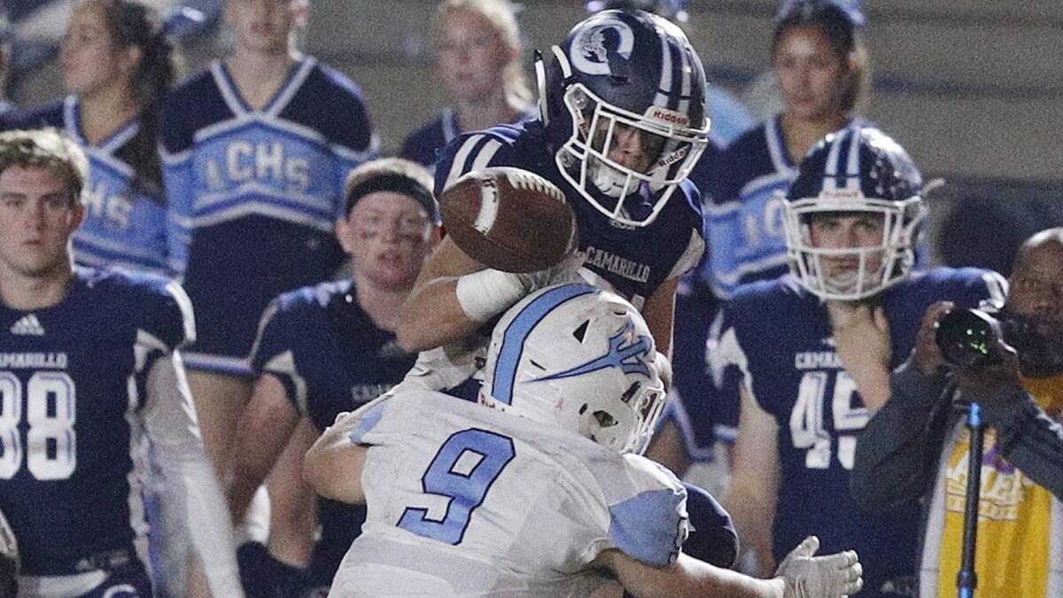 Corona del Mar High's Luke Fisher makes sure Camarillo's Tyler Macasieb does not catch the ball right before halftime of the CIF Southern Section Division 4 semifinals on Nov. 16.