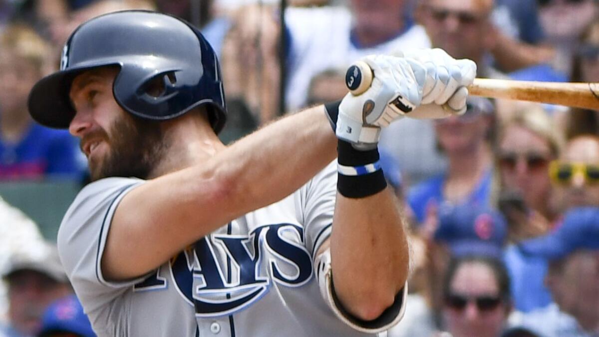 Evan Longoria hits an RBI single for the Tampa Bay Rays against the Chicago Cubs on July 5.