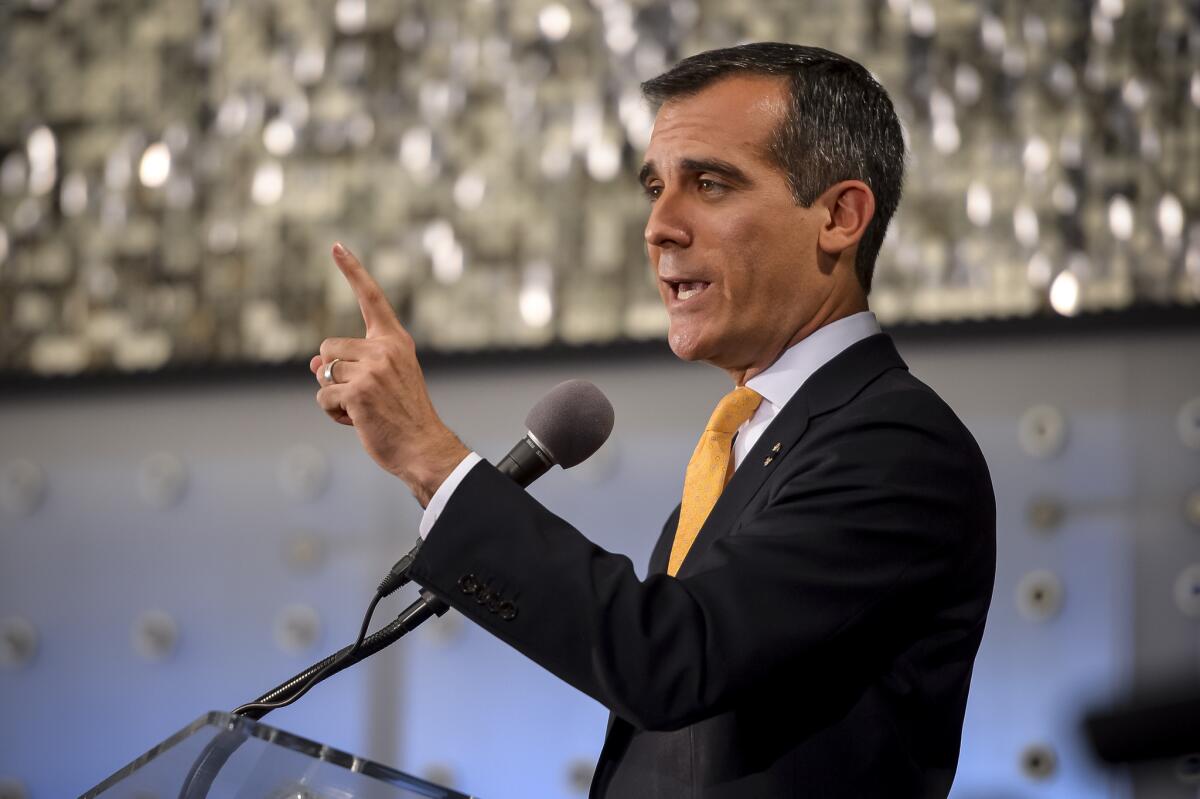 Los Angeles mayor Eric Garcetti delivers his first State of the City address before a crowd at the California Science Center.
