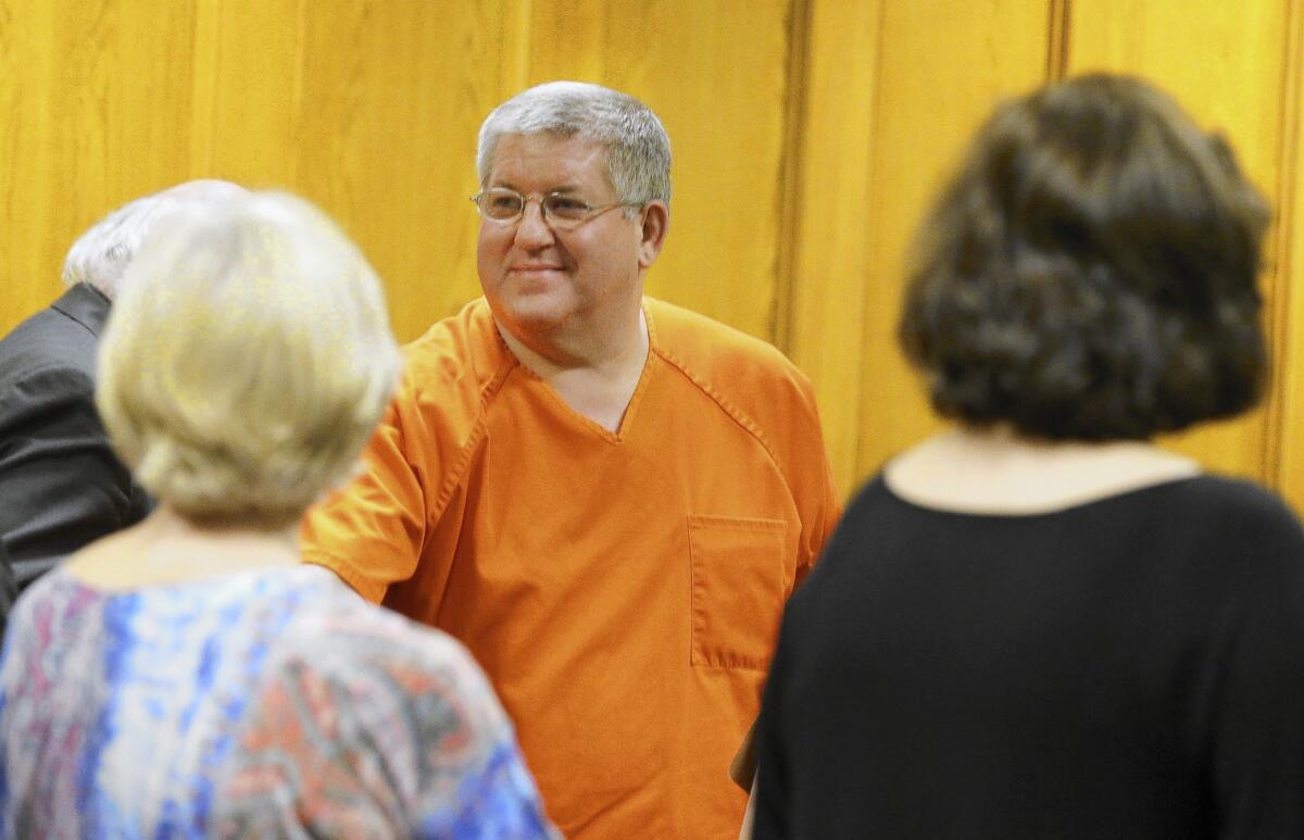 Bernie Tiede, who was serving a life sentence, smiles at the courthouse in Panola County, Texas, after a judge granted his release.