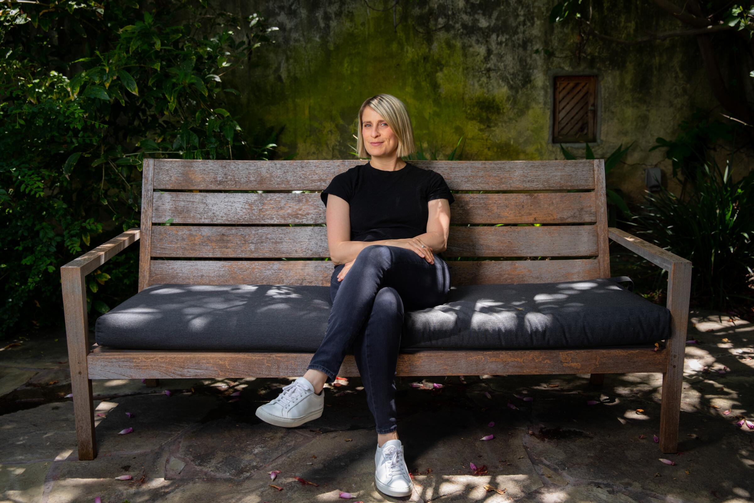 Liz Feldman, showrunner for the series "Dead to Me" on Netflix, is photographed in the backyard of her Los Angeles home during the COVID-19 pandemic. 