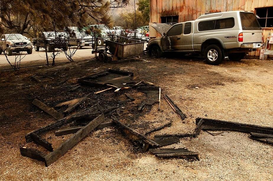 The burned-out service area and vehicle at the Los Prietos Ranger Station.