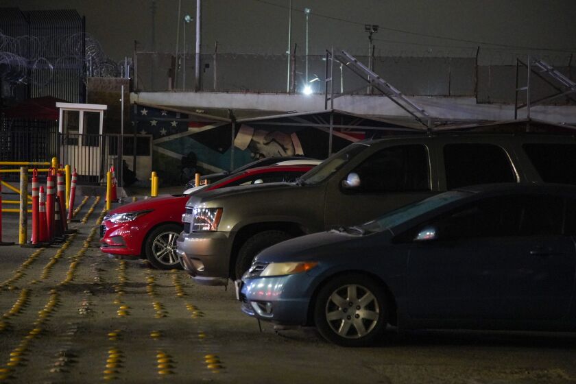 Tijuana, Baja California, May 22nd, 2020 | Cars that wait at the front of the line arrived around 10pm the night before. People have been sleeping in their cars at the Otay border to wait for the port of entry to open; it started happening after the hours of service of the border port of entry were reduced. | (Alejandro Tamayo, The San Diego Union Tribune 2020)