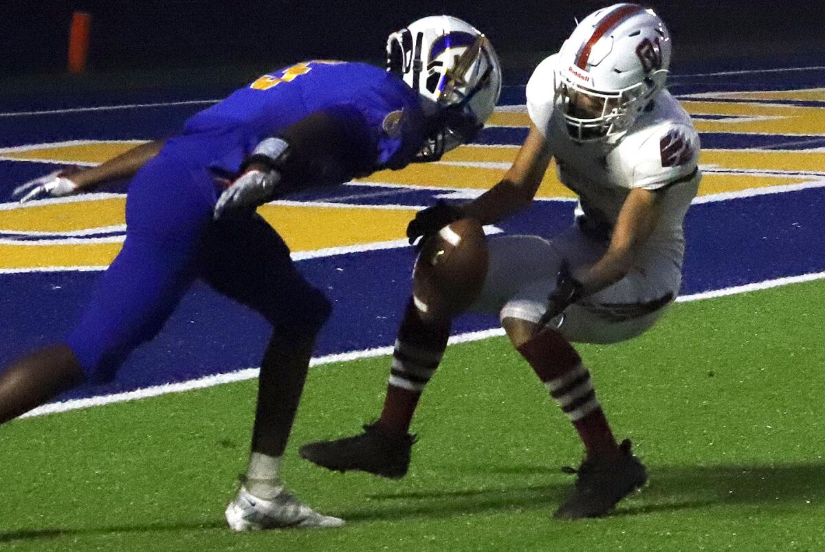 Ocean View's Josh Crain (9) recovers a punt touched by a Gahr player in a nonleauge football game on Friday.