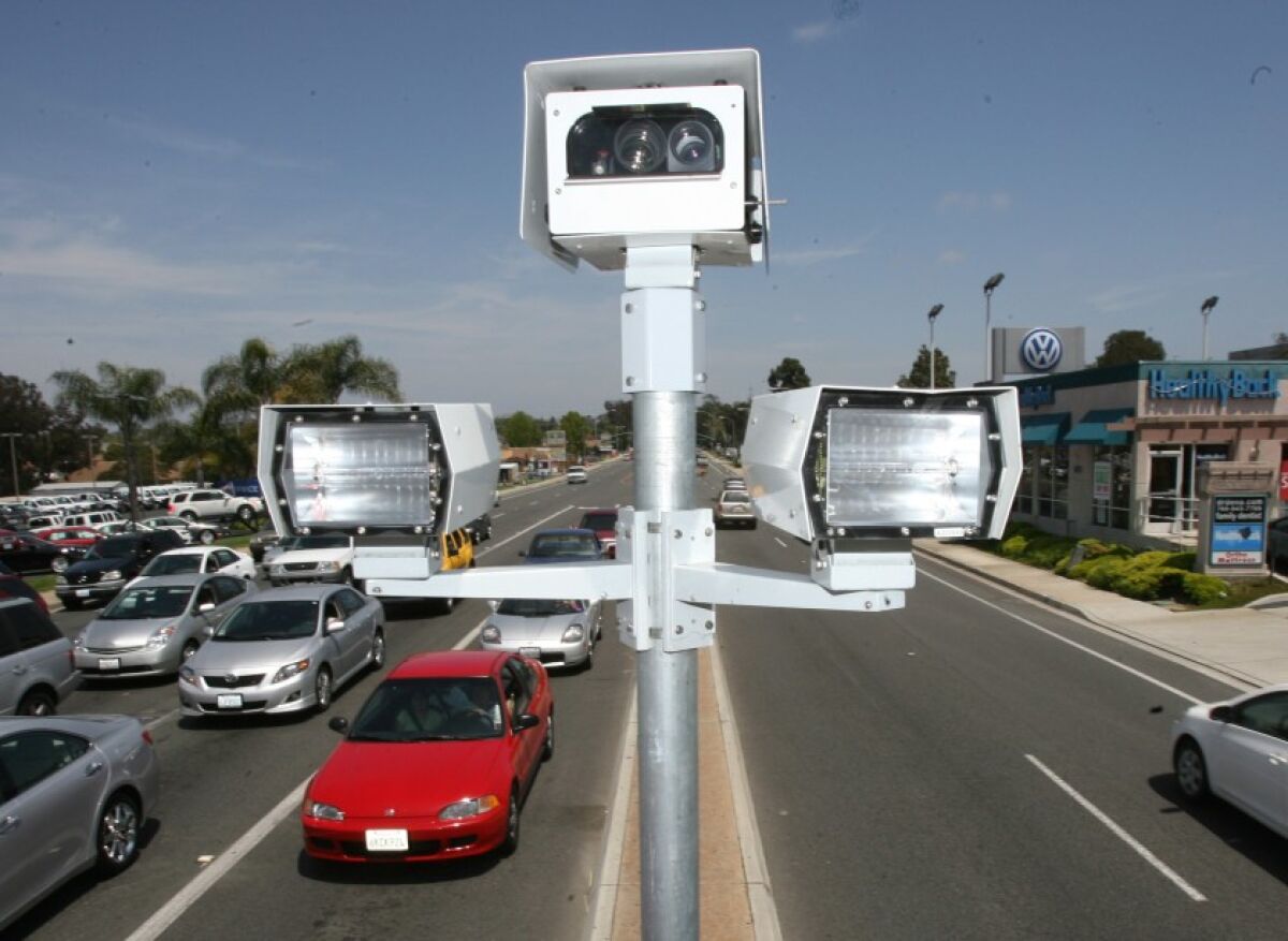 Red light cameras at the corner of Encinitas Blvd and El Camino Real in Encinitas.