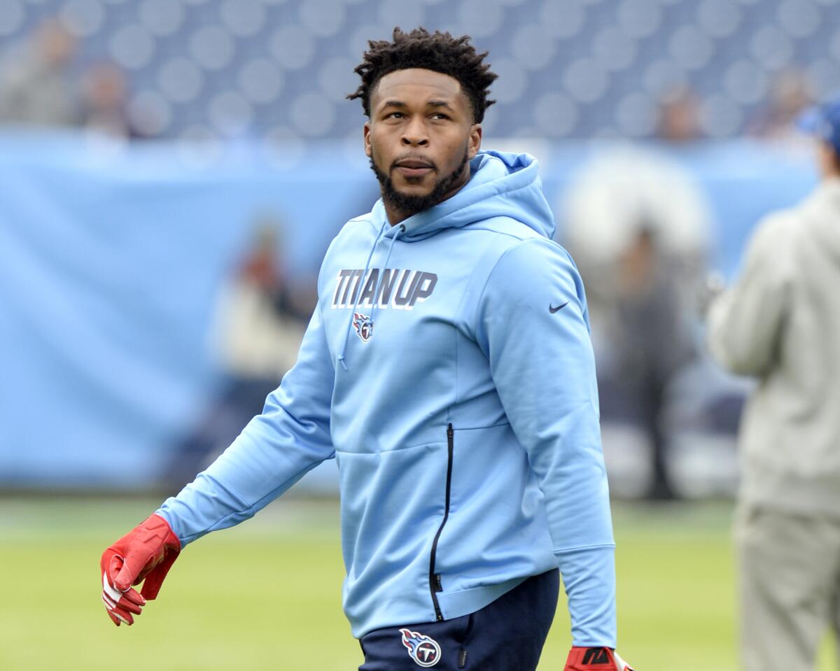 Titans safety steps up, aids in son's surprise home delivery - The