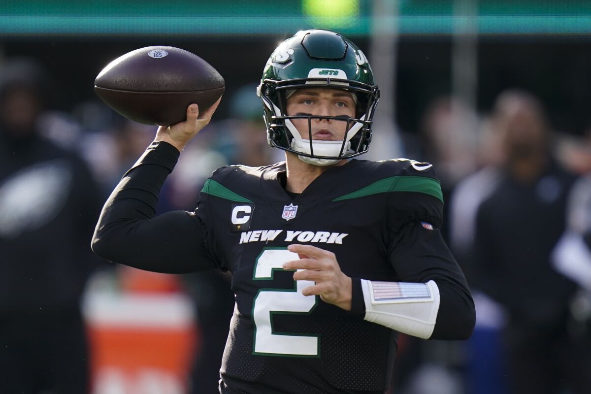 New York Jets quarterback Zach Wilson passes during the first half of an NFL football game against the Philadelphia Eagles, Sunday, Dec. 5, 2021, in East Rutherford, N.J. (AP Photo/Seth Wenig)