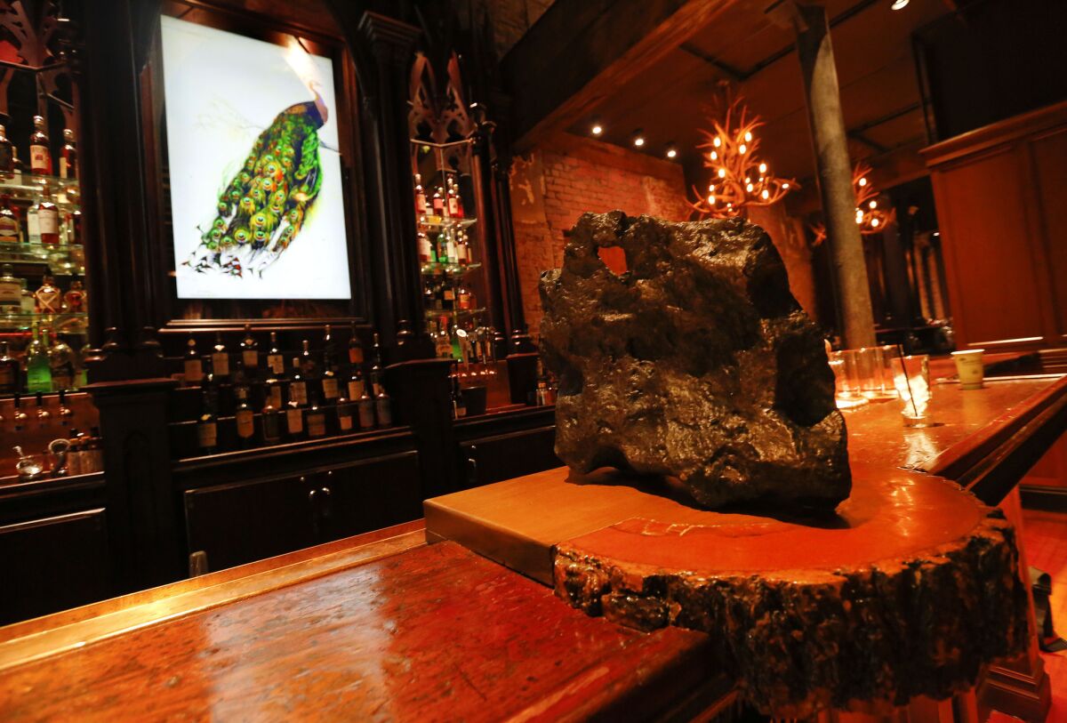 A real meteorite, found in Venezuela, is on display inside the Gothic bar of the newly reopened Clifton's cafeteria.