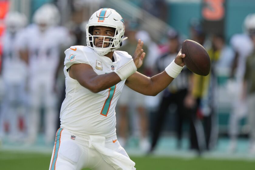Miami Dolphins quarterback Tua Tagovailoa (1) aims the ball during the first half of an NFL football game against the Cleveland Browns, Sunday, Nov. 13, 2022, in Miami Gardens, Fla. (AP Photo/Lynne Sladky)
