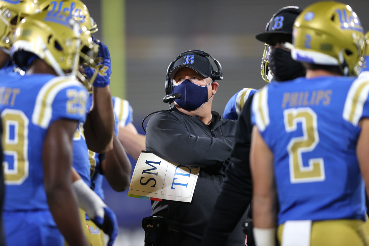 UCLA coach Chip Kelly looks on during the first half against USC.