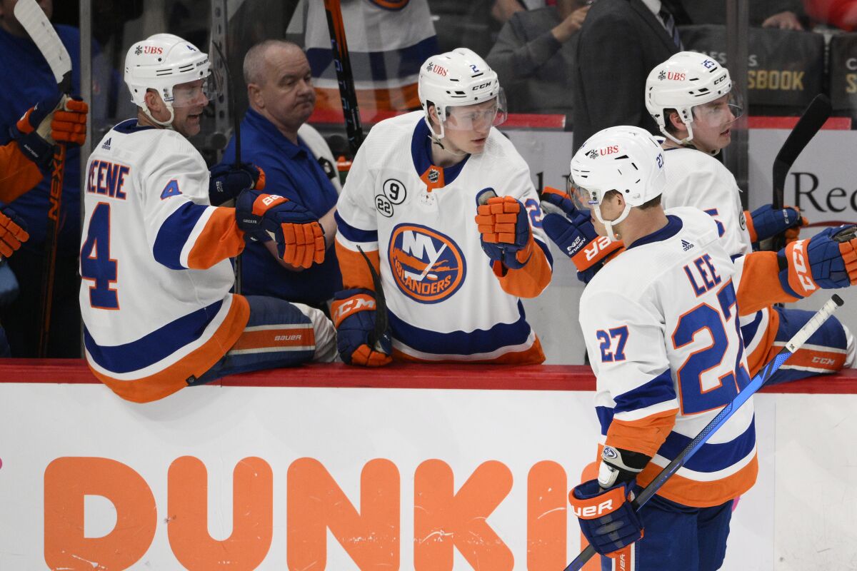 New York Islanders left wing Anders Lee (27) celebrates his goal during the third period of an NHL hockey game against the Washington Capitals, Tuesday, April 26, 2022, in Washington. The Islanders 4-1. (AP Photo/Nick Wass)