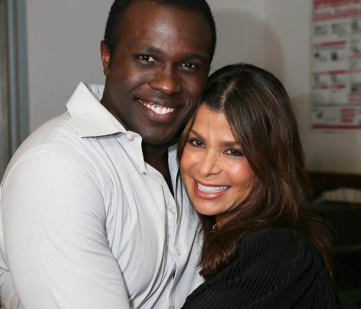 Paula Abdul embraces actor Joshua Henry backstage at the Ahnmanson Theatre after the opening night performance of "The Scottsboro Boys."