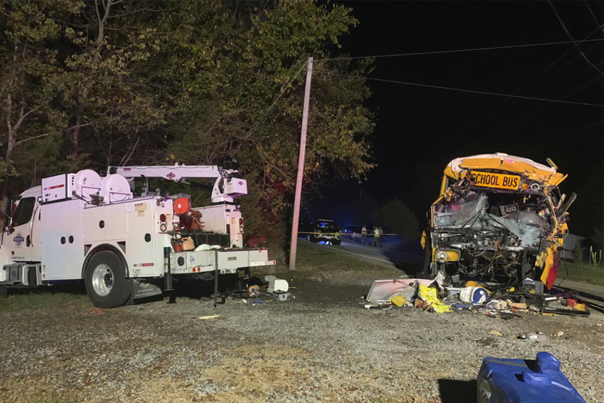 FILE - This photo provided by the Tennessee Highway Patrol shows the scene of deadly crash involving a utility vehicle and a school bus carrying children on Oct. 27, 2020, in Decatur, Tenn. The National Transportation Safety Board on Thursday, Nov. 3, 2022, renewed its call for seat belts on school buses after completing an investigation of a 2020 Tennessee crash that killed the driver and a 7-year-old girl. (Tennessee Highway Patrol via AP, File)