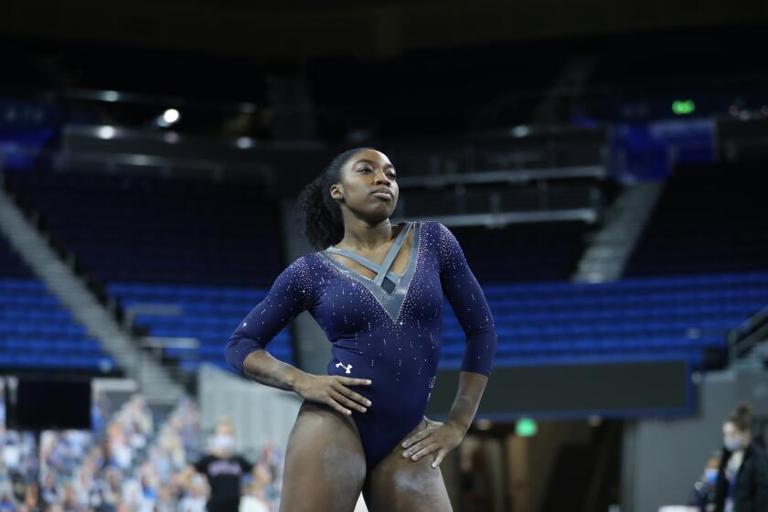 UCLA gymnast Chae Campbell practices a floor exercise routine at Pauley Pavilion on Jan. 12, 2021.