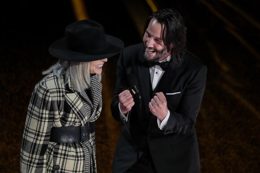 TNS AND WIRE SERVICES OUT. NO SALES. CALTIMES NEWSPAPERS AND WEBSITES ONLY. HOLLYWOOD, CA – February 9, 2020: Presenters Diane Keaton and Keanu Reeves speak on stage during the telecast of the 92nd Academy Awards on Sunday, February 9, 2020 at the Dolby Theatre at Hollywood & Highland Center in Hollywood, CA. (Robert Gauthier / Los Angeles Times)