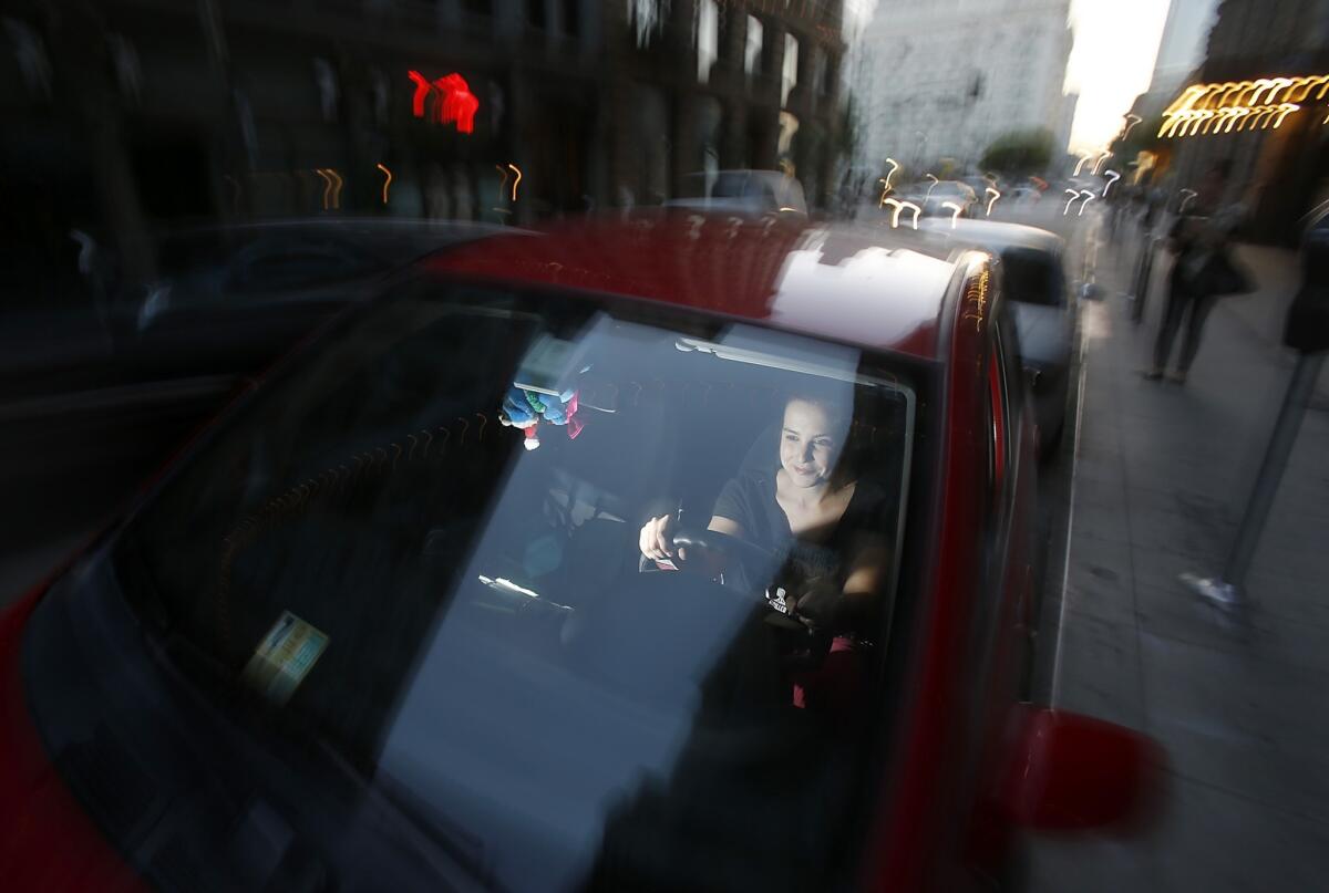 Ruth Grayson is a driver for the ridesharing service Lyft. Lyft and similar companies such as Uber are working to kill a California insurance bill backed by insurers and taxi firms.