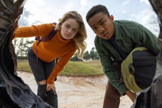 Kylie Rogers stars as Chloe Marsh and Asante Blackk as Adam Campbell in director Cory Finley's LANDSCAPE WITH INVISIBLE HAND A Metro Goldwyn Mayer Pictures film Photo credit: Lynsey Weatherspoon © 2023 Metro-Goldwyn-Mayer Pictures Inc. All Rights Reserved