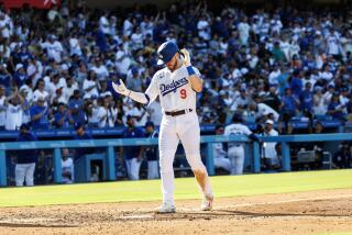 Dodgers second base Gavin Lux reacts as he crosses the plate after hitting a solo home run against the Boston Red Sox 