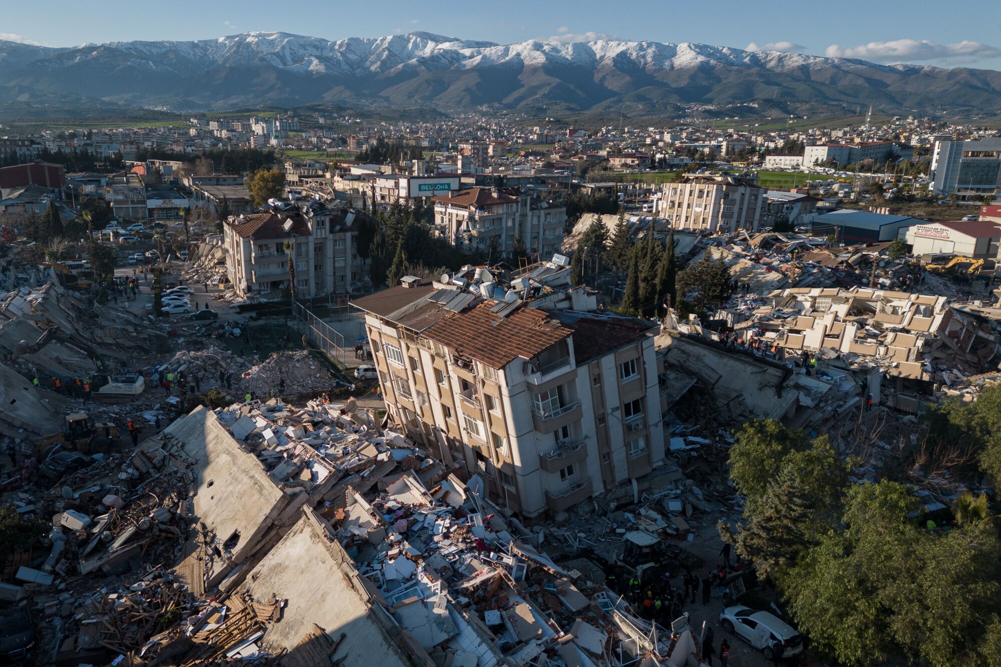 Crews search for Turkey earthquake victims as death tolls climbs General view of buildings in Antakya, Turkey, destroyed in the recent earthquake
