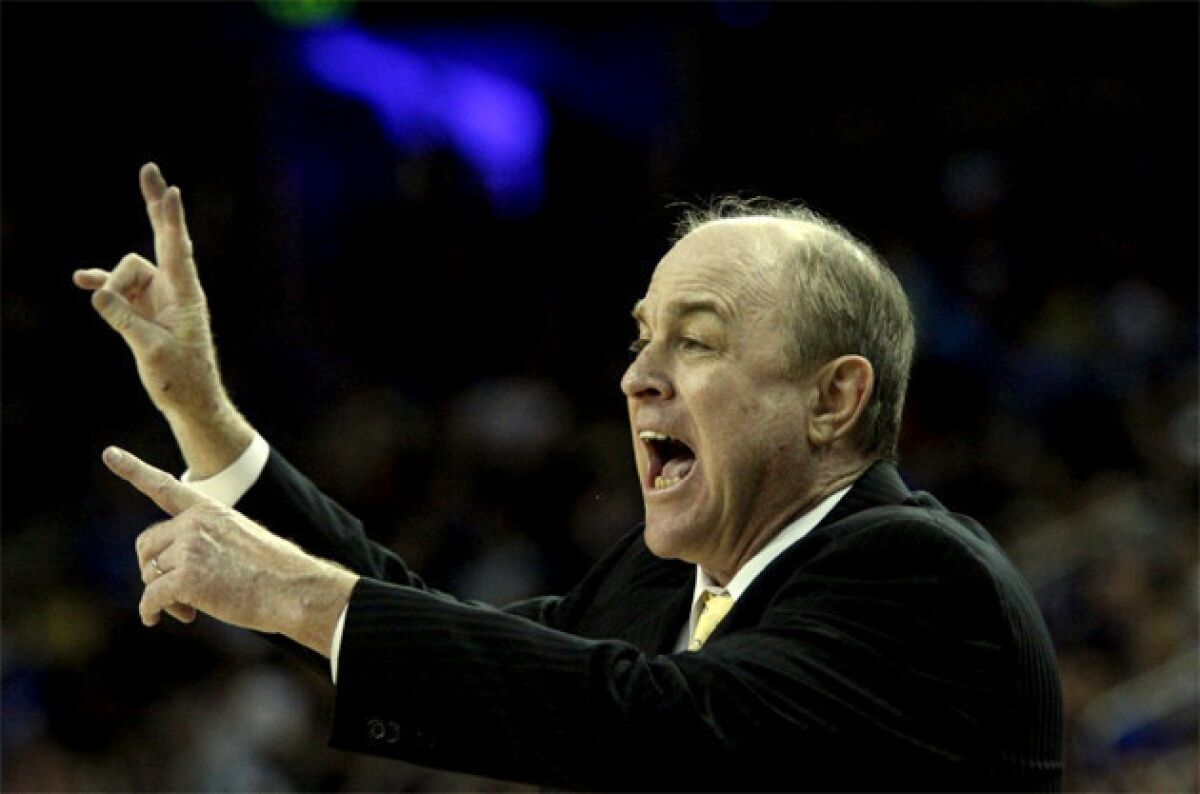 UCLA Coach Ben Howland instructs his team in a game against Arizona.